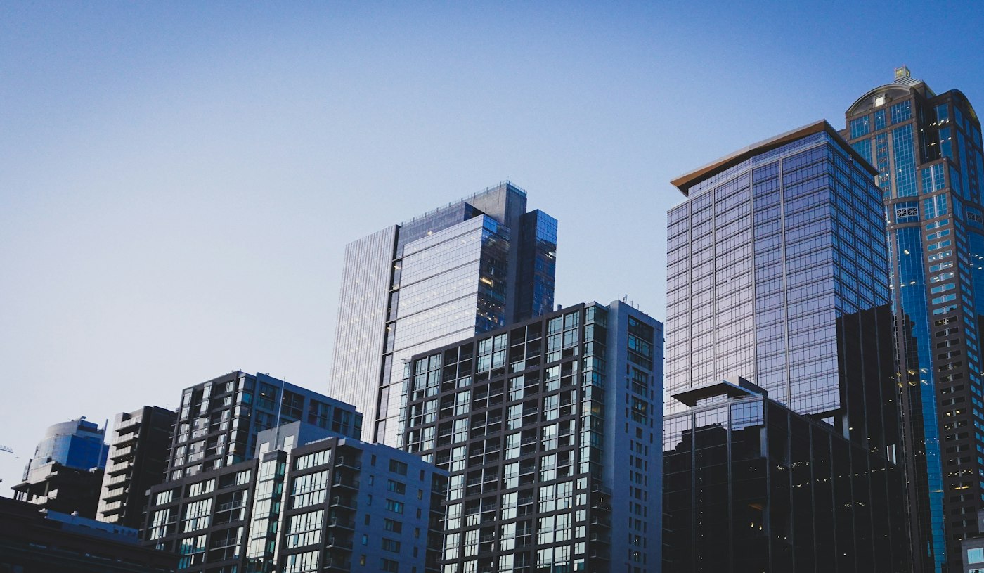 A modern city skyline of homes and condominiums